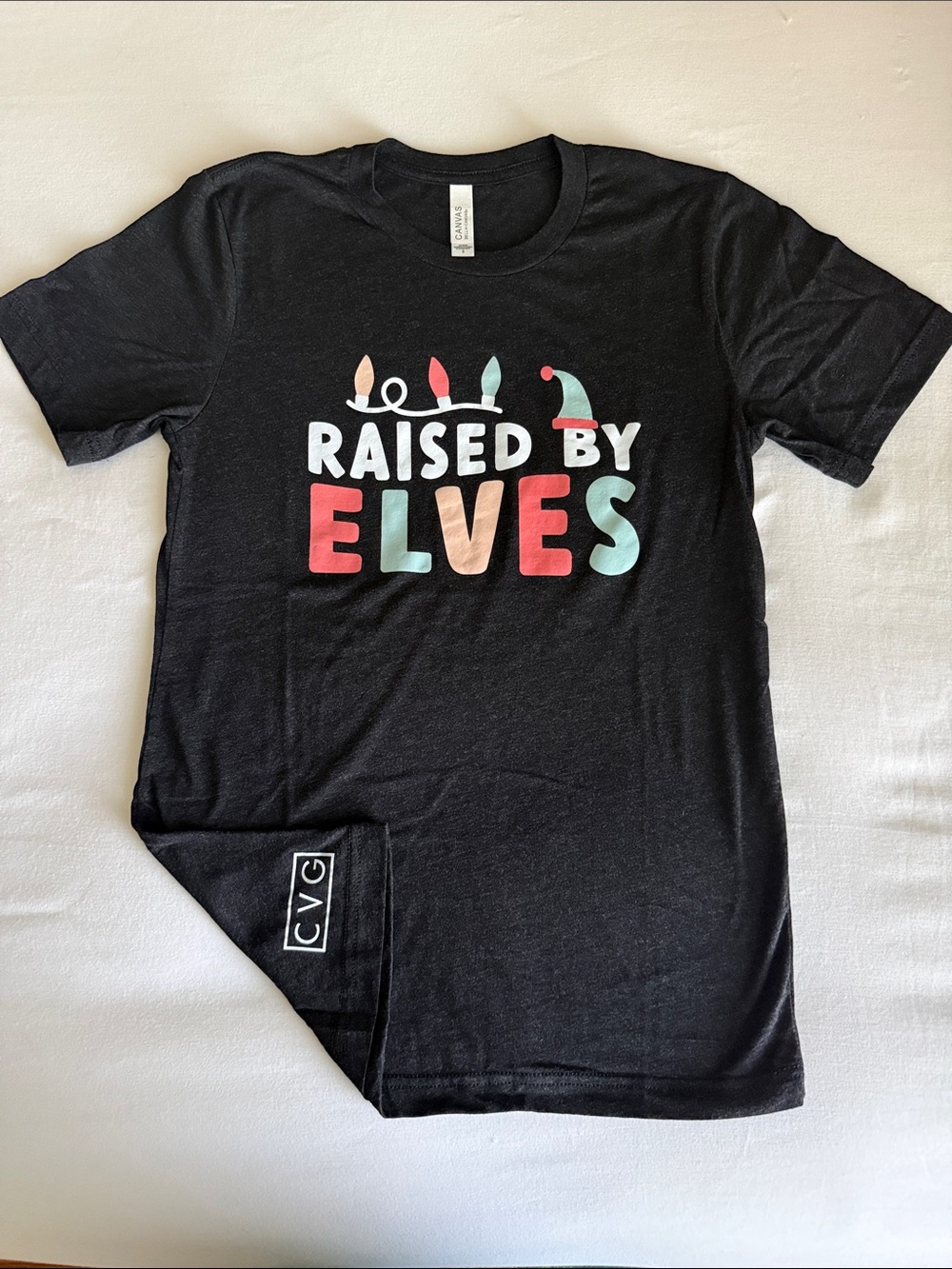 Small “Raised by Elves” T-shirt